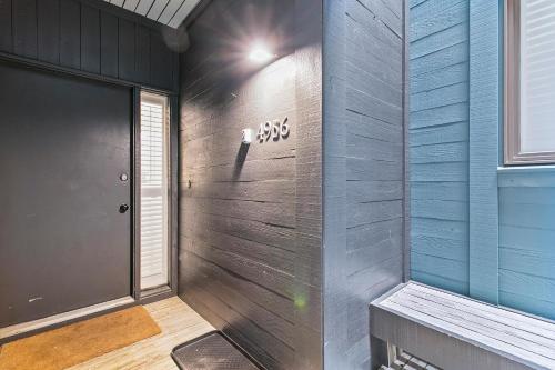 a room with a wall with a bench and a window at 4956 Green Dolphin in Kiawah Island