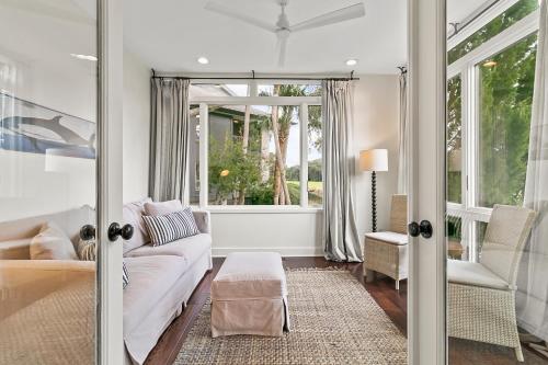 a living room with a couch and a window at 4956 Green Dolphin in Kiawah Island