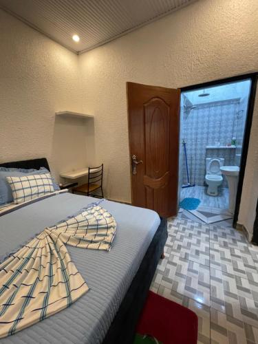 Llit o llits en una habitació de Tivana