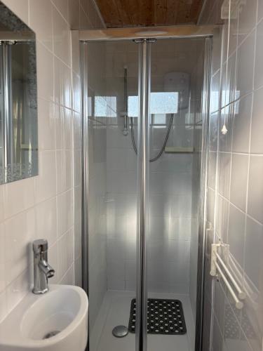a bathroom with a shower and a sink at g11 chalet in Mablethorpe