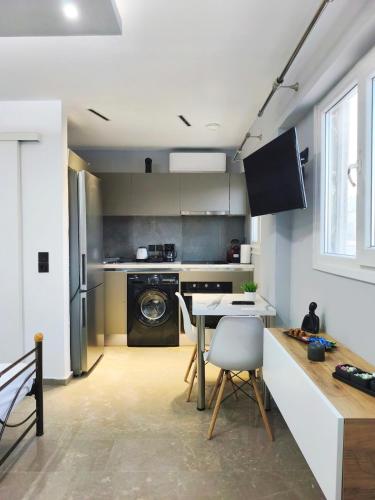 ครัวหรือมุมครัวของ Msquared Apartment 3