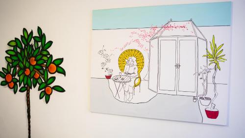 a drawing of a woman looking out of a window at Igloo Hybrid in Nottingham
