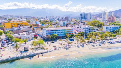 an aerial view of a beach in a city at Panamerican Hostel in Santa Marta