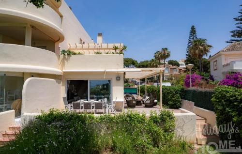 Holidays & Home BeachFront Neptuno II, garden, beach, pool ,Elviria ,Marbella