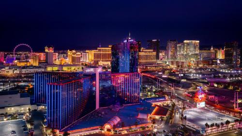 a view of a city at night with at Masquerade Tower at Rio Hotel & Casino in Las Vegas