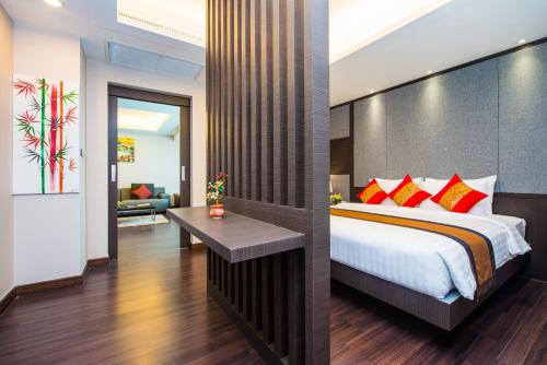 Postel nebo postele na pokoji v ubytování Tetris Hotel