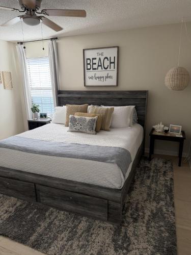 a bedroom with a large bed in a room at Sea the Good in Panama City Beach