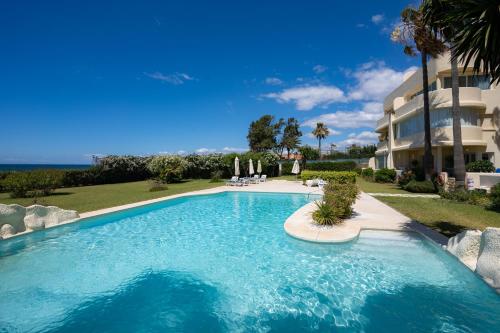 Holidays & Home BeachFront Neptuno II, garden, beach, pool ,Elviria ,Marbella