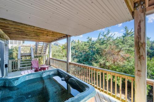 a hot tub on the deck of a house at 7834 - Royal - T in Frisco