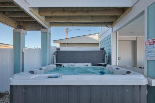 a hot tub sitting on top of a house at 5700 - La Cebolla in Nags Head