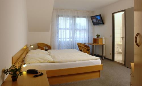 Katil atau katil-katil dalam bilik di Westfälischer Hof