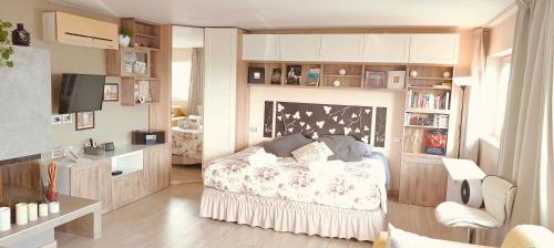 a bedroom with a bed in a room at Panoramic Luxury Little Penthouse in Florence