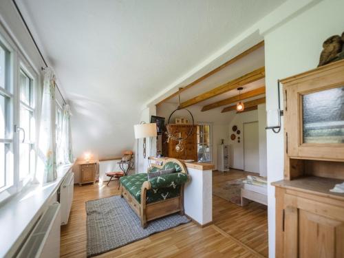 a living room with a couch and a table at Naturpark Chalet Schladming-Dachstein in Großsölk