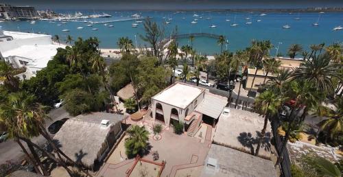 an aerial view of a house next to a harbor at Sandy Shores Cabaña 10B in La Paz