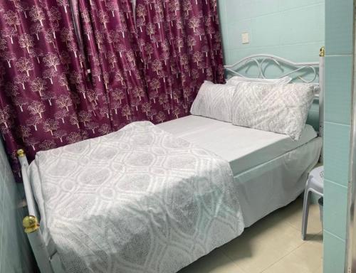 Postelja oz. postelje v sobi nastanitve RELIANCE homestay
