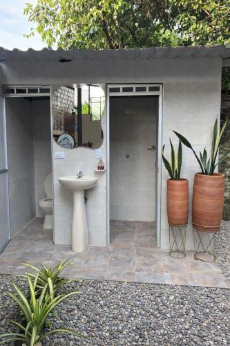 a bathroom with a sink and a toilet at Casa Roma in Rivera