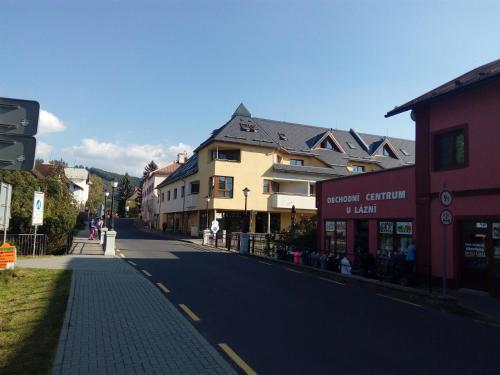 an empty street in a town with buildings at Apartmá Kateřina Velké Losiny in Velké Losiny