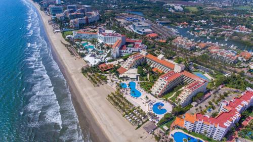 an aerial view of the beach and the ocean at Occidental Nuevo Vallarta - All Inclusive in Nuevo Vallarta