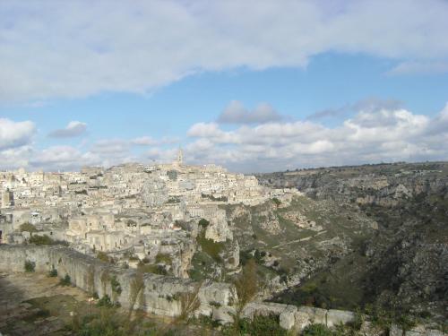 a view of a city on a mountain at Le Stelle Nei Sassi in Matera