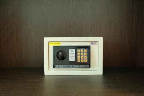a small electronic device sitting on top of a table at A Plus Deluxe Hotel in Ko Lipe