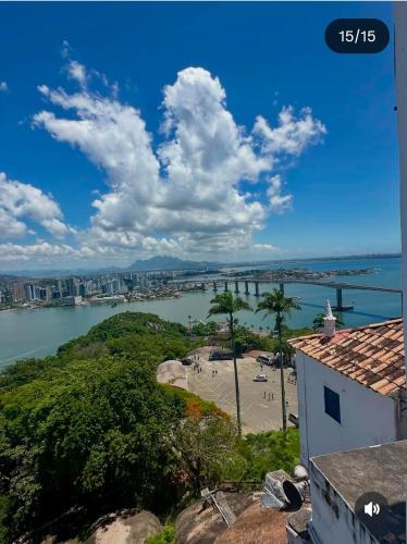 a view of the water from a building at Ambiente familhiar in Guarapari