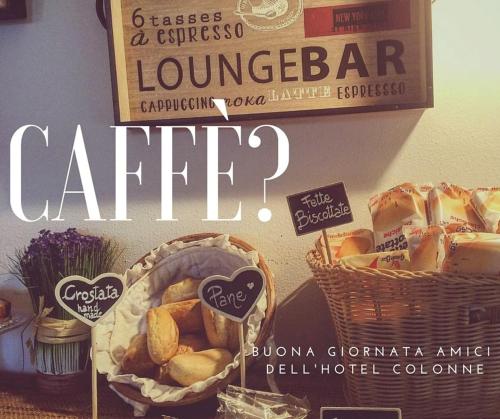 a poster for a bakery with a basket of bread at Hotel Colonne in San Giovanni Rotondo