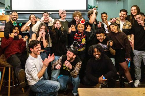 a group of people posing for a picture at Palmers Lodge Swiss Cottage in London