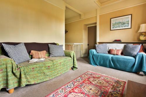 a living room with two couches and a rug at Finest Retreats - Bourne Edge in Morland