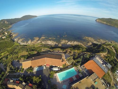an aerial view of a beach and the ocean at Village de vacances Paese di Lava, Grand Ajaccio in Alata
