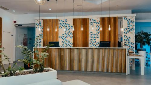 an office with a lobby with a reception desk at BLUESEA Corralejo Village in Corralejo
