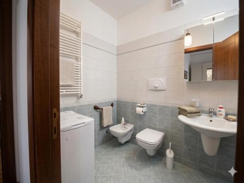 a bathroom with a toilet and a sink at TRIESTE - Premium Villas in Giulianova