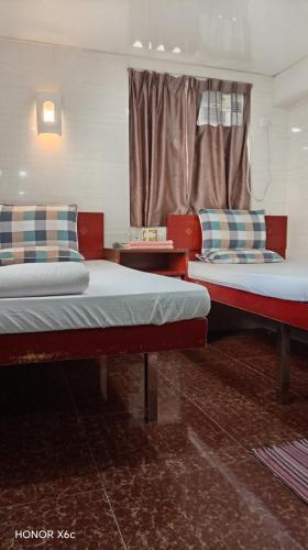 Llit o llits en una habitació de Zodiac lodge