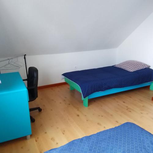 Säng eller sängar i ett rum på Le Tranquillou