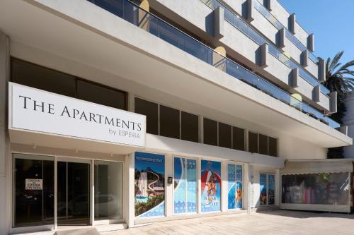 a building with a sign that reads the apartmentments by agreement at The Apartments by Esperia in Rhodes Town
