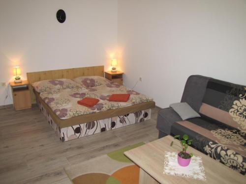 Ένα ή περισσότερα κρεβάτια σε δωμάτιο στο Privát Magdalena