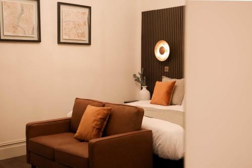a living room with a couch and a bed at Lovely Studio Flat on Bath Road - Flat 2 in Bristol