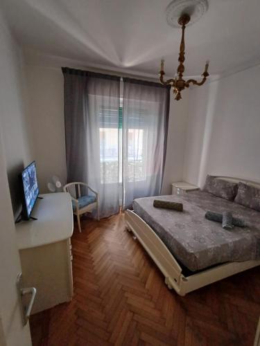 Säng eller sängar i ett rum på ALTEREGO HOUSE RAPALLO