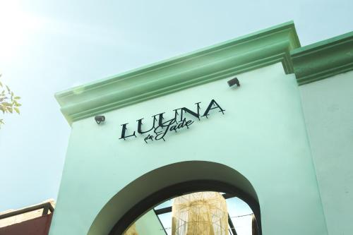 a sign on the side of a building at Luuna de Jade in Oaxaca City