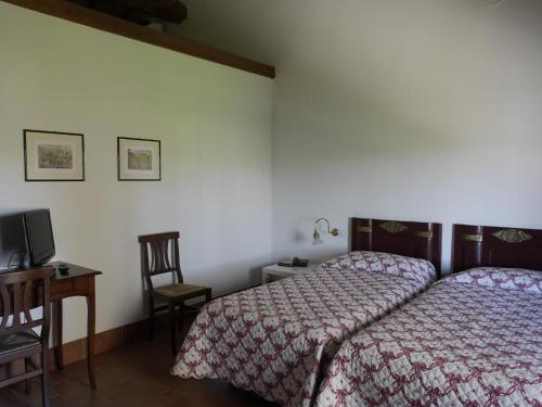 เตียงในห้องที่ Agriturismo San Bruno