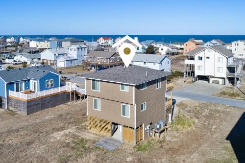 an aerial view of a house in a town at 4740 - August's Summer Place in Kitty Hawk Beach