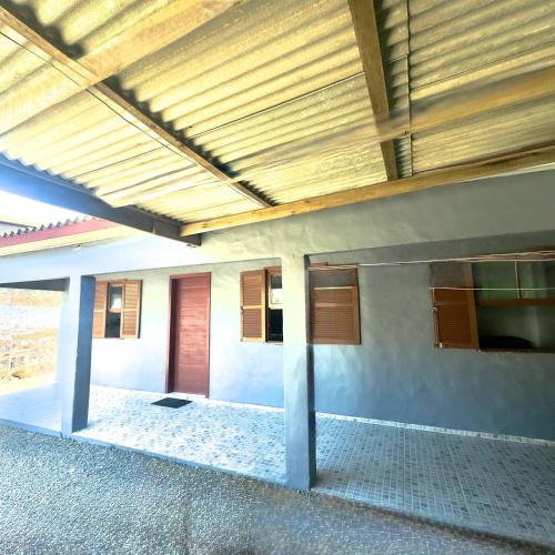 an empty building with a wooden ceiling and a room at Blue 52 in Torres