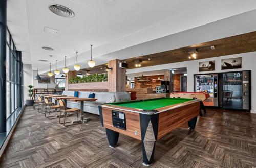 a room with a pool table in a restaurant at The Parade - Cardiff - 10 Min Walk to City Centre in Cardiff