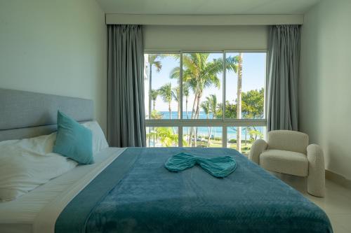 Llit o llits en una habitació de Sea Winds Cabarete