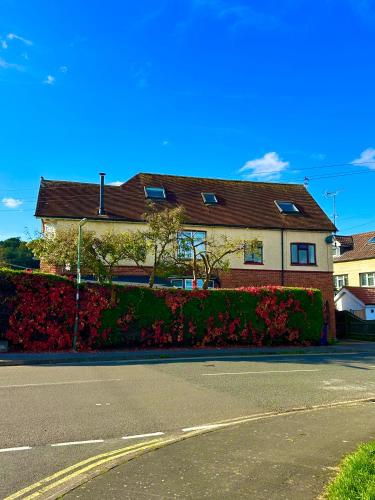 a house on the side of a street at Pound Corner in Godalming