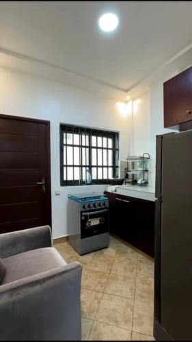 Кухня або міні-кухня у Tofa2