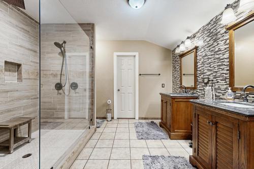 a bathroom with a shower and a sink at Bacliff Family Getaway w/ Game Room + Private Pool in Bacliff