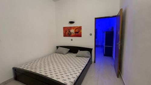 Llit o llits en una habitació de Tofa3