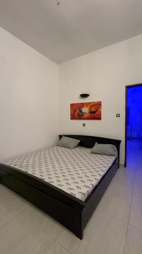 Llit o llits en una habitació de Tofa3