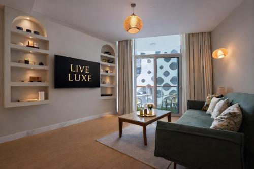 Direct Burj View Waterfront 1BR - Live Luxe