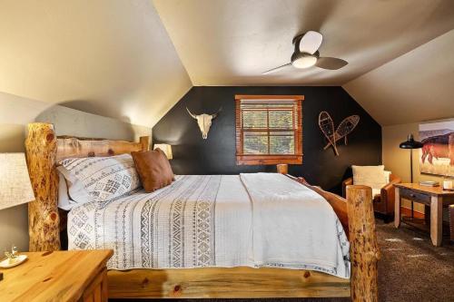 a bedroom with a wooden bed and a window at The Great Escape in Lead